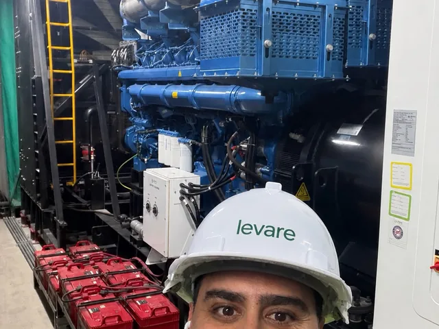 Moustafa Ibrahim beside mission-critical mechanical plant